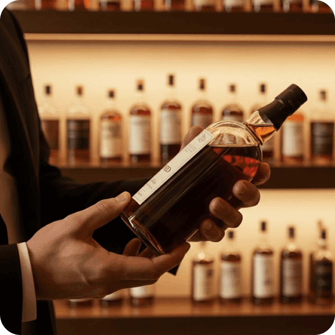 Holding Whisky Bottle